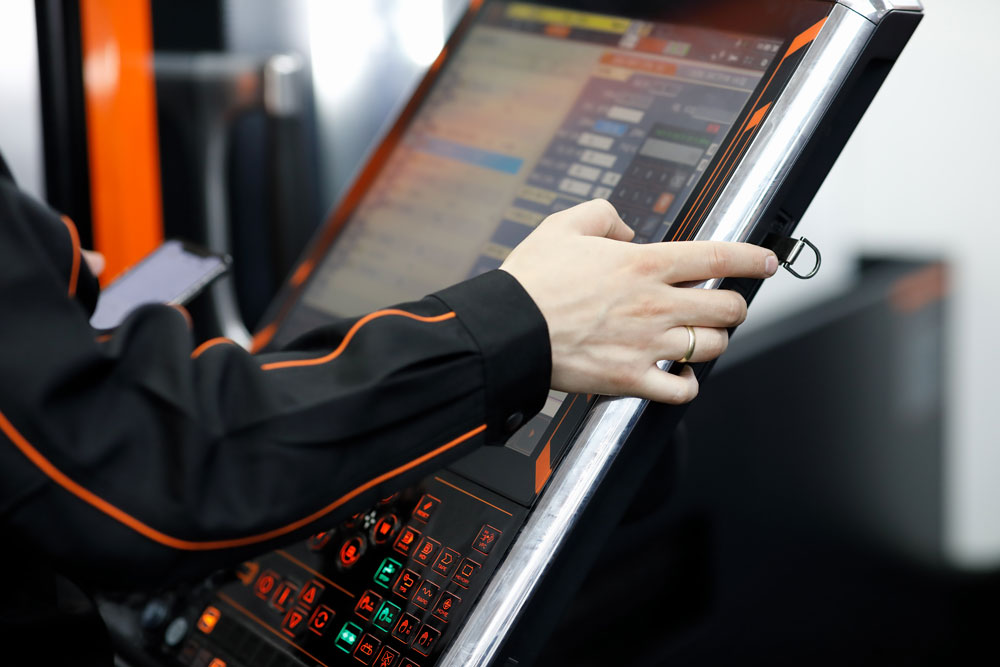 Operator working with touch screen control panel